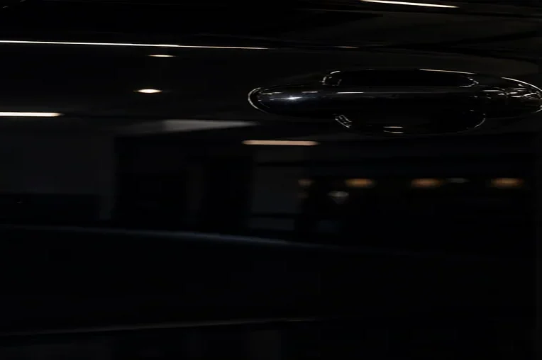 Fictional polished dark paint surface after correction